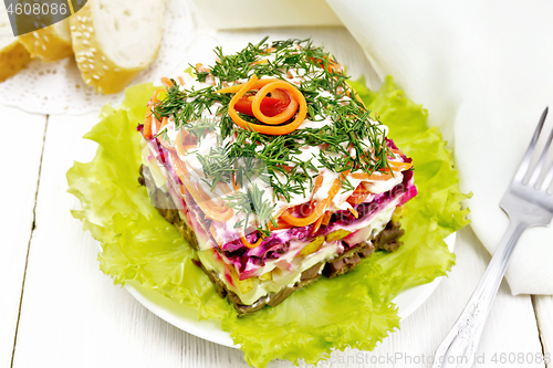 Image of Salad with beef and vegetables on table