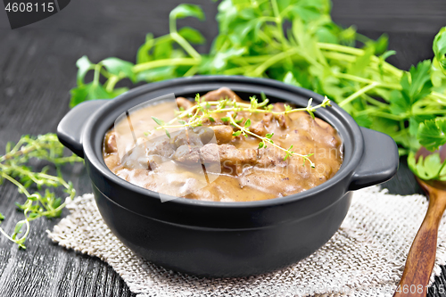 Image of Goulash of beef in pan on board