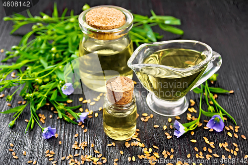 Image of Oil flaxseed on wooden board