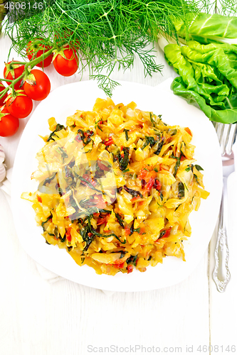 Image of Cabbage stew with chard in plate on light board top