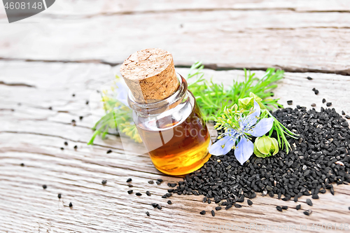 Image of Oil kalingi in bottle on wooden board