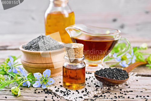 Image of Oil kalingi in bottles and gravy boat on board