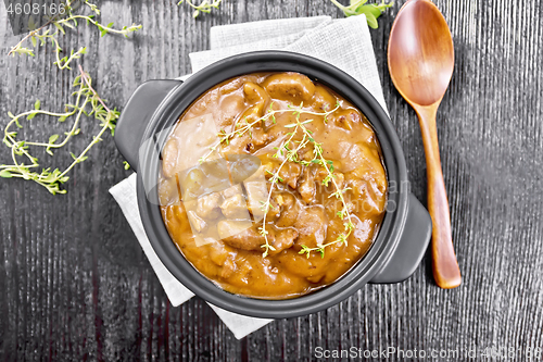 Image of Goulash of beef in pan on black board top