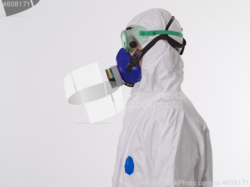 Image of Doctor wearing protective biological suit and mask due to corona