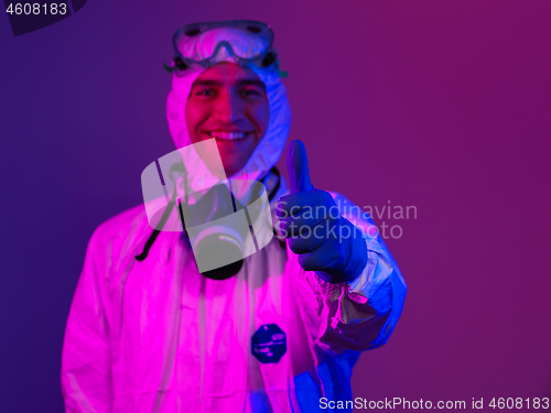 Image of Doctor wearing protective biological suit and mask due to corona