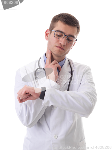 Image of doctor using smartwatch while checking heartbeat pulse