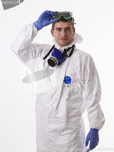 Image of Doctor wearing protective biological suit and mask due to corona