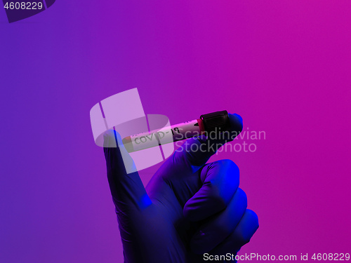 Image of Coronavirus, Doctor holding positive covid-19 virus Blood Sample