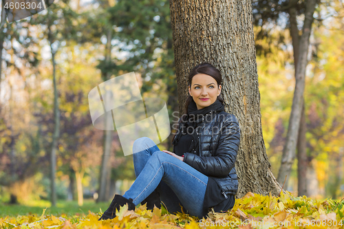 Image of Woman in a Forest in the Autumn