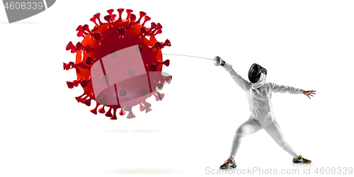 Image of Professional sportswoman kicking, punching coronavirus model - fight the desease, flyer