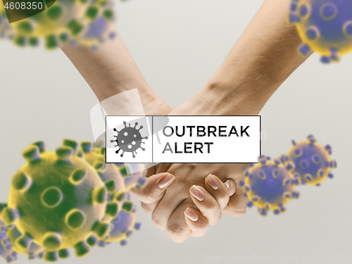 Image of Human hands shaking, avoid greeting while coronavirus epidemic - concept of spreading of virus