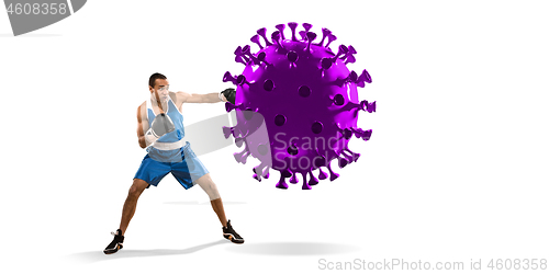 Image of Professional sportsman kicking, punching coronavirus model - fight the desease, flyer