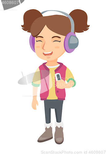 Image of Caucasian girl listening to music in headphones.
