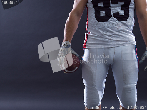 Image of closeup American Football Player isolated on gray