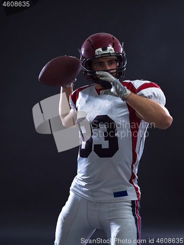 Image of american football player throwing ball