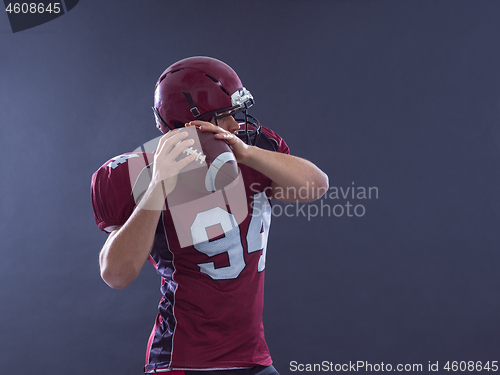 Image of american football player throwing ball