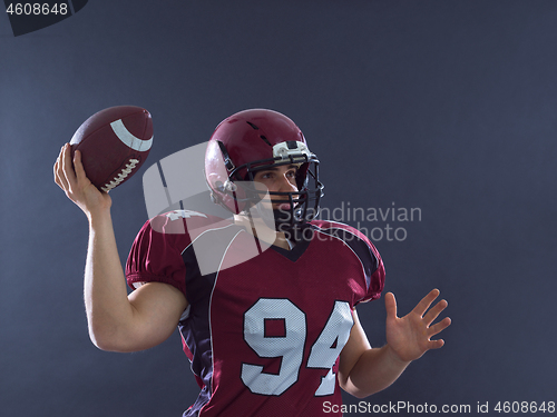 Image of american football player throwing ball