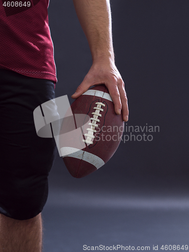 Image of closeup American Football Player isolated on gray