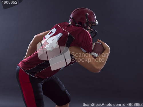 Image of American football Player running with the ball