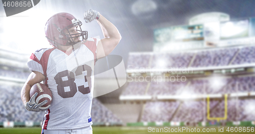 Image of american football player celebrating touchdown