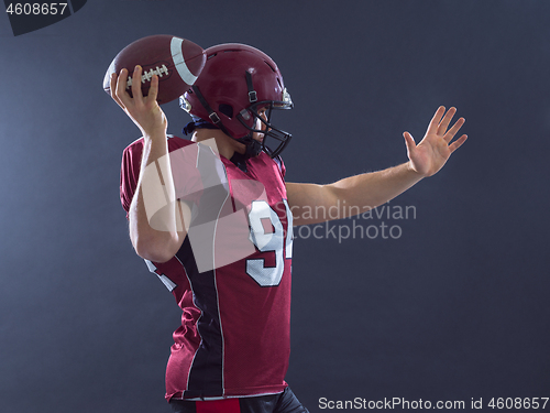 Image of american football player throwing ball