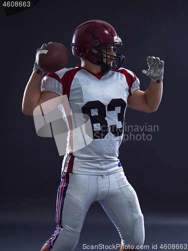 Image of american football player throwing ball