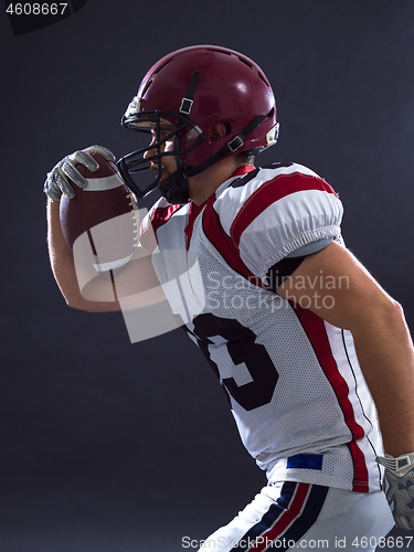 Image of American football Player running with the ball