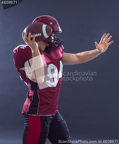 Image of american football player throwing ball