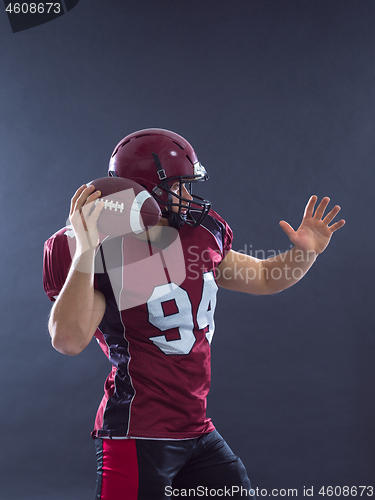 Image of american football player throwing ball