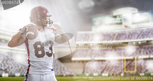 Image of American Football Player isolated on big modern stadium field