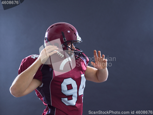 Image of american football player throwing ball