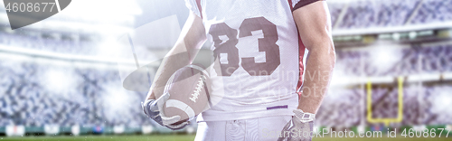 Image of closeup American Football Player isolated on big modern stadium