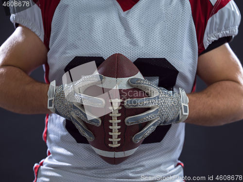 Image of American Football Player isolated on gray