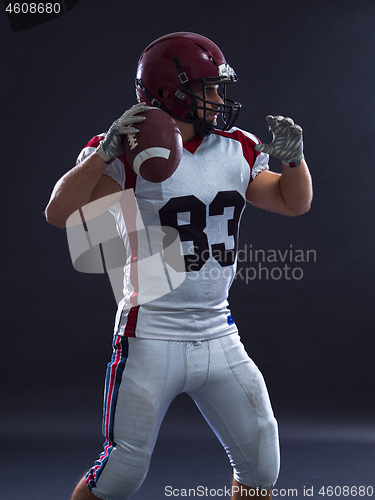 Image of american football player throwing ball