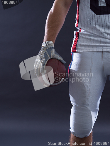 Image of closeup American Football Player isolated on gray