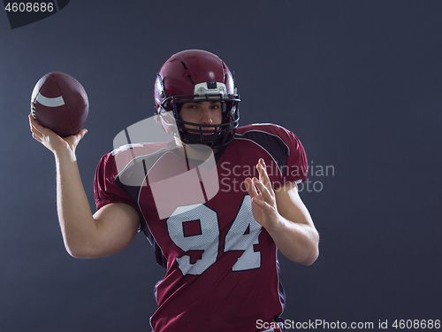 Image of american football player throwing ball