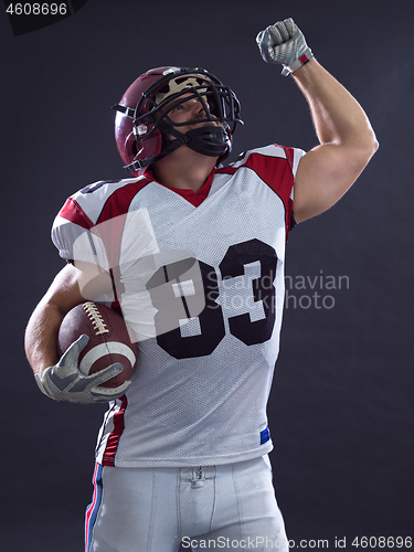 Image of american football player celebrating touchdown