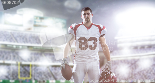 Image of American Football Player isolated on big modern stadium field