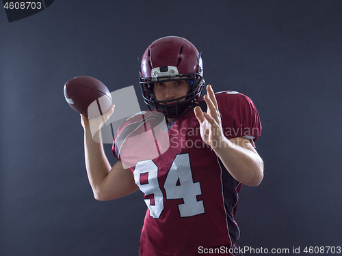 Image of american football player throwing ball