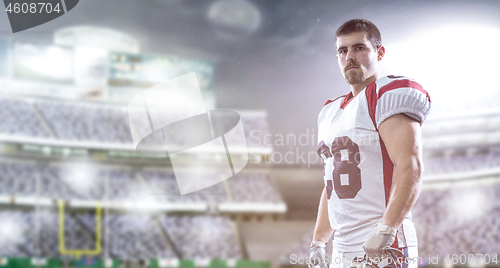 Image of American Football Player isolated on big modern stadium field
