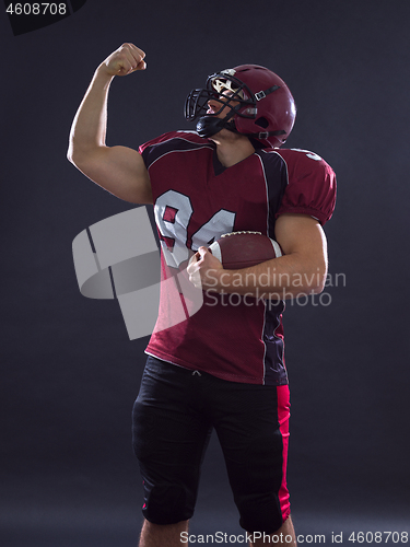 Image of american football player celebrating touchdown