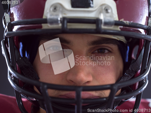 Image of closeup American Football Player isolated on gray