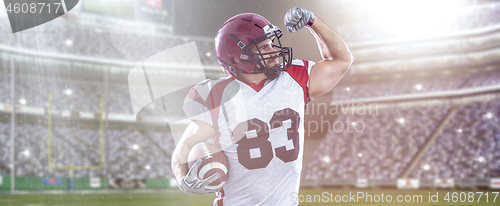 Image of american football player celebrating touchdown