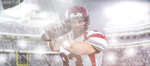 Image of american football player throwing ball