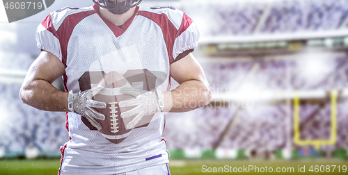 Image of closeup American Football Player isolated on big modern stadium