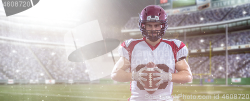 Image of American Football Player isolated on big modern stadium field