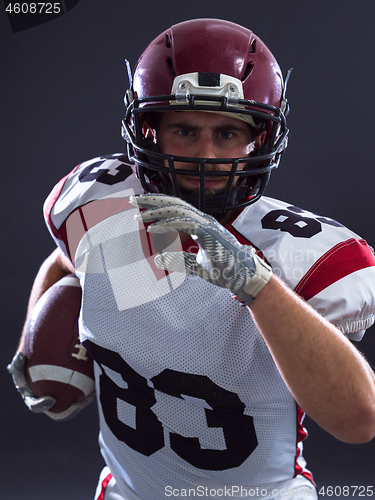 Image of American football Player running with the ball