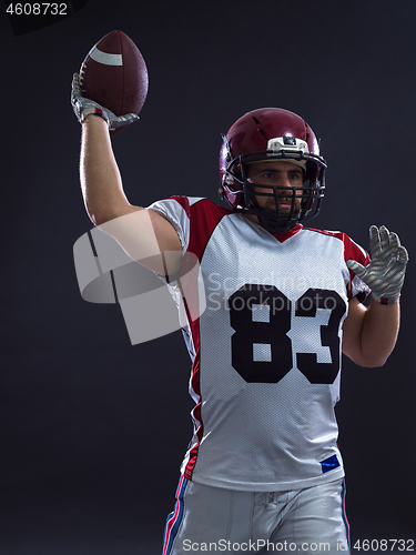 Image of american football player throwing ball