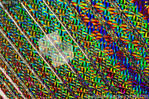 Image of Texture of red foil with holographic effect. Christmas background.