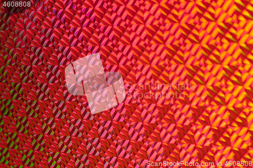 Image of Texture of red foil with holographic effect. Christmas background.